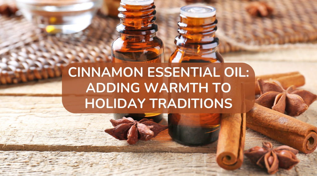 bottles of cinnamon essential oil and cinnamon sticks